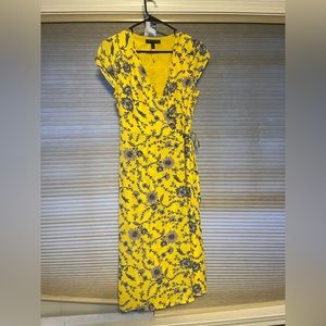 Beautiful, never been worn.  Yellow with blue flowers.